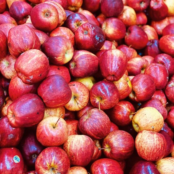 Close-up of a heap of shiny red apples